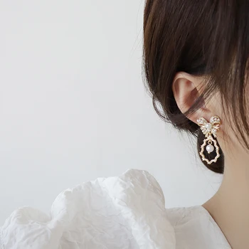 Kórejský horúce módne šperky 14K reálne pozlátené medi vykladané AAA zirkón elegantné náušnice luk žien svadobné party náušnice