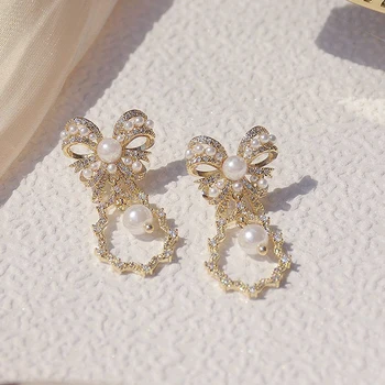 Kórejský horúce módne šperky 14K reálne pozlátené medi vykladané AAA zirkón elegantné náušnice luk žien svadobné party náušnice