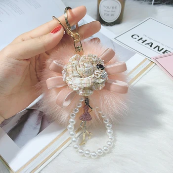 Nové jesenné a zimné keychain kórejský tvorivé camellia fox kožušiny loptu keychain pearl reťazca, batoh auto keychain nádherné penda