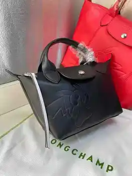 Nové Longxiang mini crossbody kožené knedľa taška
