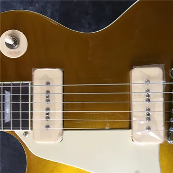 Veľkoobchod a maloobchod nové P90 snímače so zlatým vzorom. Na ľavej strane gitara elektrická gitara. Vysoká kvalita. Doprava zadarmo